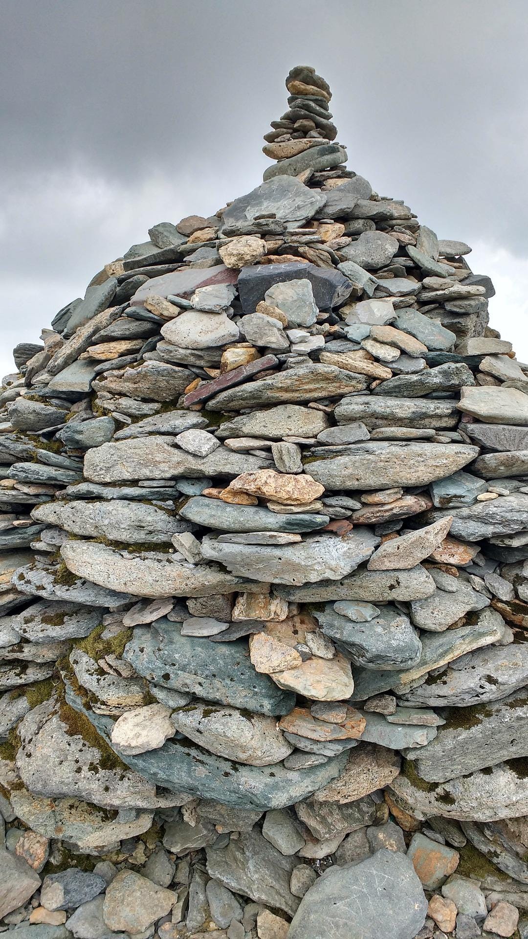 A stone cairn on the summit of the Old Man of Coniston