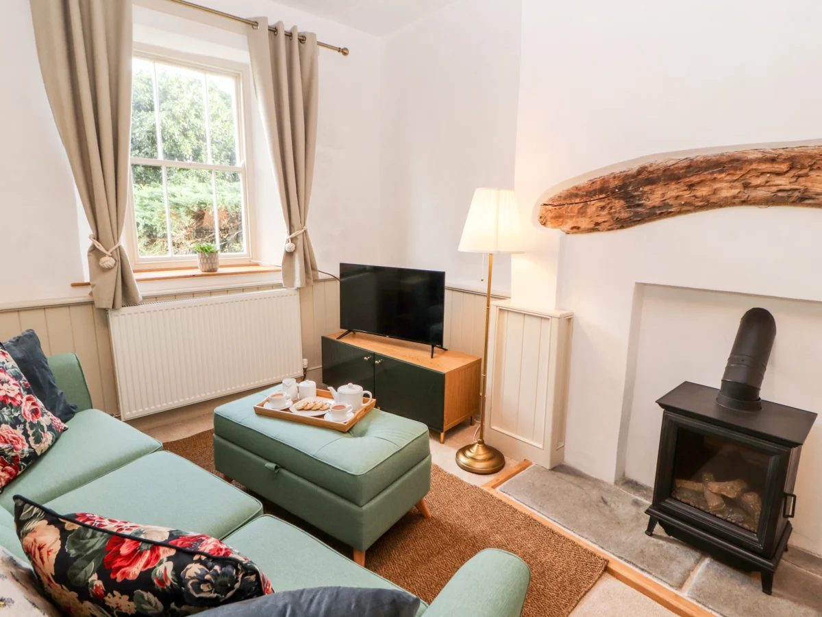 Natland Hall Cottage, a delightful abode resting in Natland, Cumbria. Two well-behaved dogs welcomed