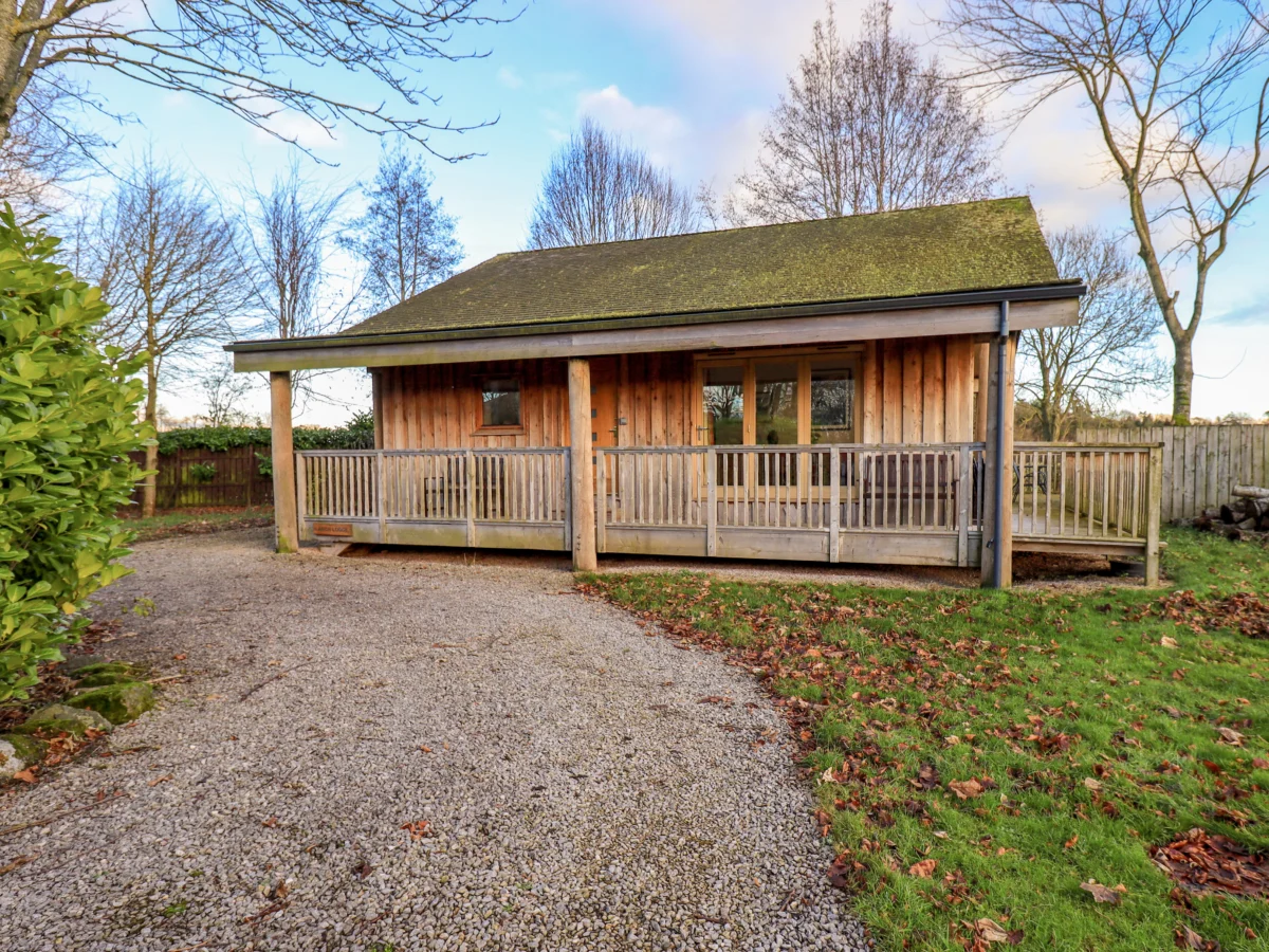Larch Lodge in Skelton, Cumbria. Single-storey. Open-plan living. Eco-friendly. En-suites. Near lake