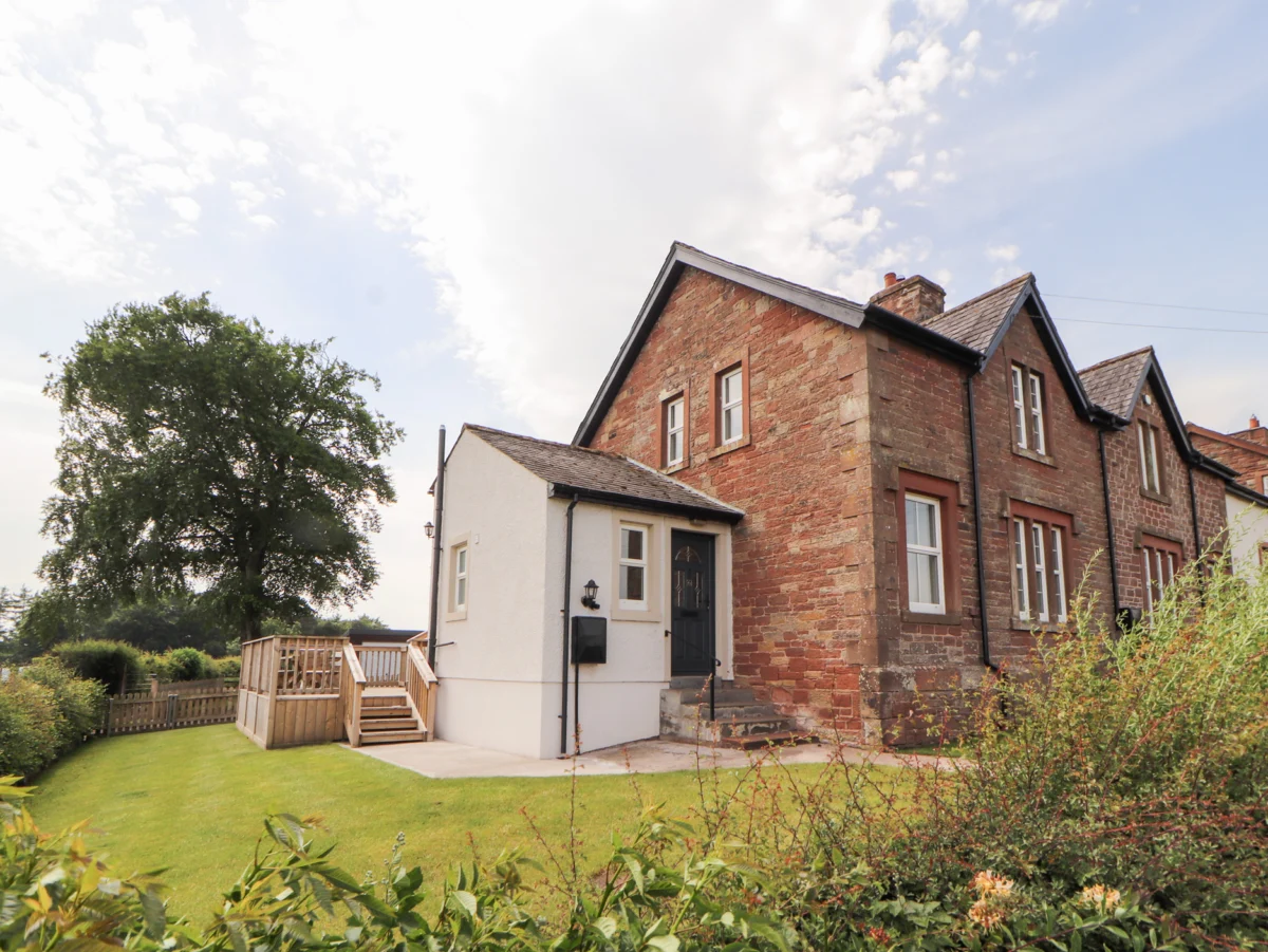 Rose Bank Cottage in Dalston, Cumbria. Three-bedroom home, with private sun terrace. Countryside.